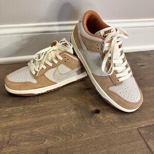 Nike Dunk Low Shoes in Tan and Cream.